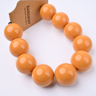 Perle in Resina Tonde 25mm Giallo Ocra - Filo da 25 cm | Sarobidy