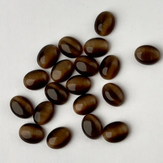 Cabochon Occhi di Gatto Ovale Marrone 9x5mm per bigiotteria e gioielli fai da te