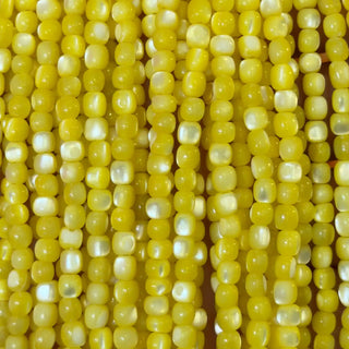 Filo di madreperla cilindro arrotondato 4 mm x 3 mm colore giallo