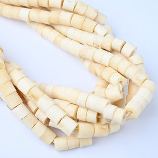 Perle in Osso Naturale Cilindri  Crema 7x6mm
