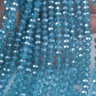Cristalli Rondella Turchese Trasparente AB 6mm