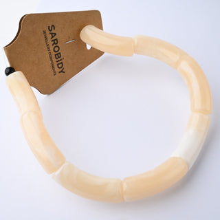 Perle in Resina Tubolari Curve Crema Marmorizzato 35x11mm