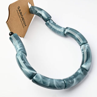 Perle in Resina Tubolari Curve Grigio Marmorizzato 35x11mm