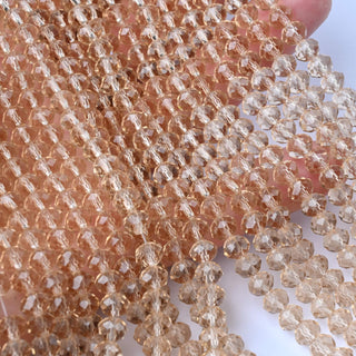 Cristalli Rondella Beige Trasparente 6mm - 10 Fili