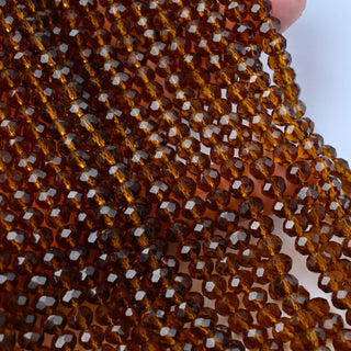 Cristalli Rondella Marrone Trasparente 6mm - 10 Fili