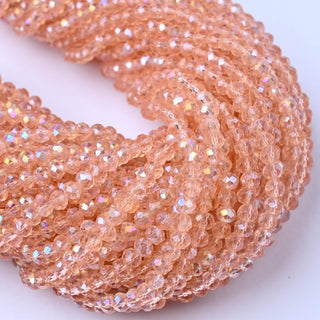 Cristalli Rondella Rosa Antico Trasparente AB 4mm - 10 Fili
