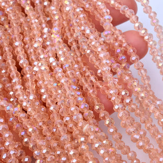 Cristalli Rondella Rosa Antico Trasparente AB 4mm