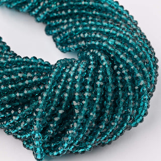 Cristalli Rondella Blu Petrolio Trasparente 4mm - 10 Fili