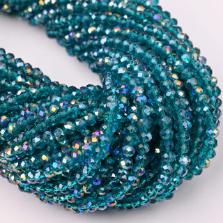 Cristalli Rondella Blu Petrolio Trasparente AB 4mm - 10 Fili