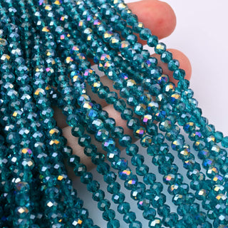 Cristalli Rondella Blu Petrolio Trasparente AB 4mm