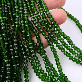 Cristalli Rondella Verde Scuro Trasparente 4mm