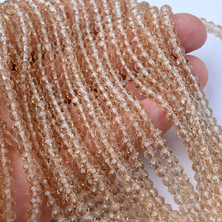Cristalli Rondella Beige Trasparente 4mm