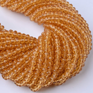 Cristalli Rondella Ambra 4mm - 10 Fili