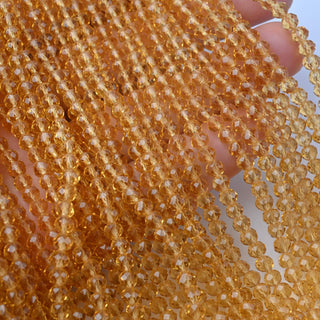 Cristalli Rondella Ambra 4mm