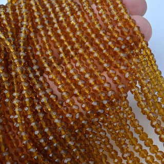 Cristalli Rondella Topazio 4mm