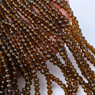 Cristalli Rondella Marrone Trasparente 4mm