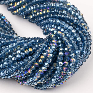 Cristalli Rondella Blu Notte Trasparente AB 4mm - 10 Fili