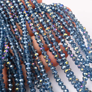 Cristalli Rondella Blu Notte Trasparente AB 4mm