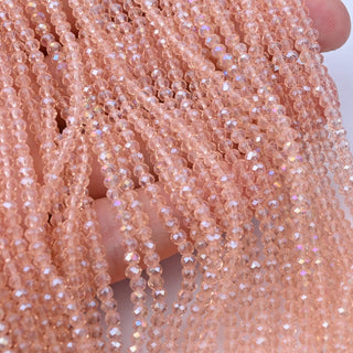 Cristalli Rondella Rosa Antico Trasparente AB 3mm - 10 Fili