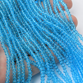 Cristalli Rondella Azzurro Trasparente 3mm