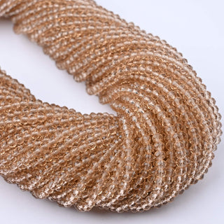 Cristalli Rondella Beige Trasparente 3mm - 10 Fili