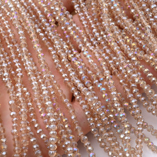 Cristalli Rondella Beige Trasparente AB 3mm