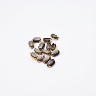 Cristalli Ovale Viola Trasparente e Oro 7x4mm - 14 pz | Sarobidy