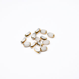 Cristalli Ovale Bianco e Oro 7x4mm - 14 pz | Sarobidy