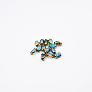 Cristalli Ovale Blu Capri Trasparente e Oro 7x4mm - 14 pz | Sarobidy