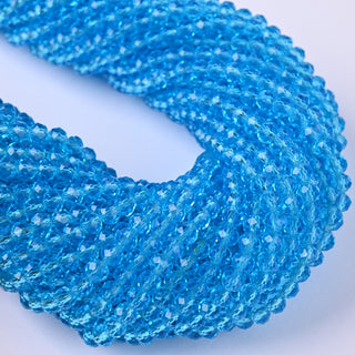 Cristalli Rondella Azzurro Trasparente 4mm