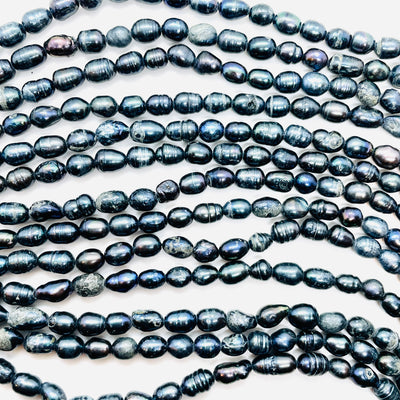 Perle Di Fiume e Coltivate - Perle di fiume tonde irregolari 9 mm circa con  riflessi oro pacco 10 pezzi 